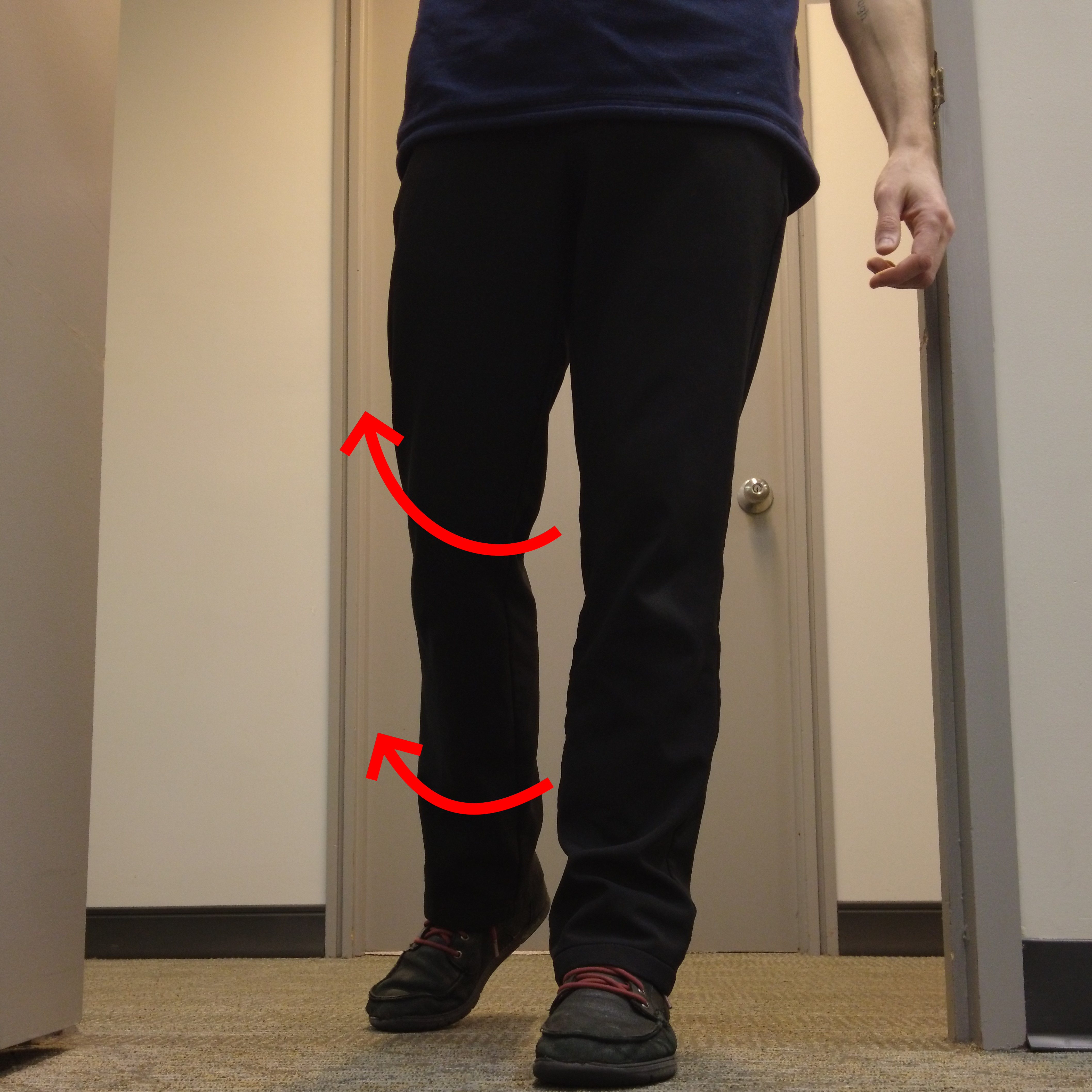 Man walking forwards with right leg rotating outwards